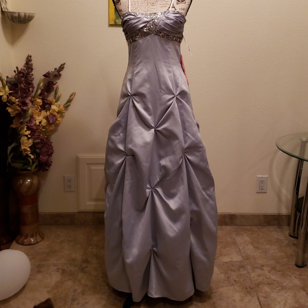 Blue Strapless Cinderella prom dress.